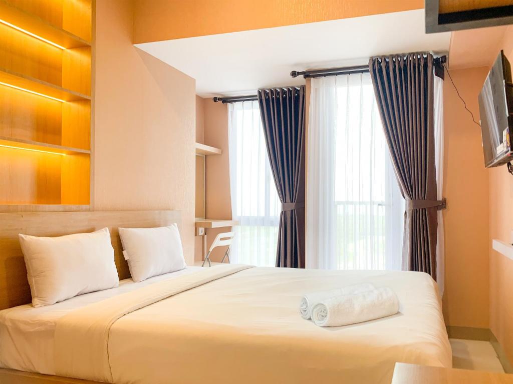 Compact Minimalist Studio at Tokyo Riverside PIK 2 Apartment By Travelio, Rawalembang