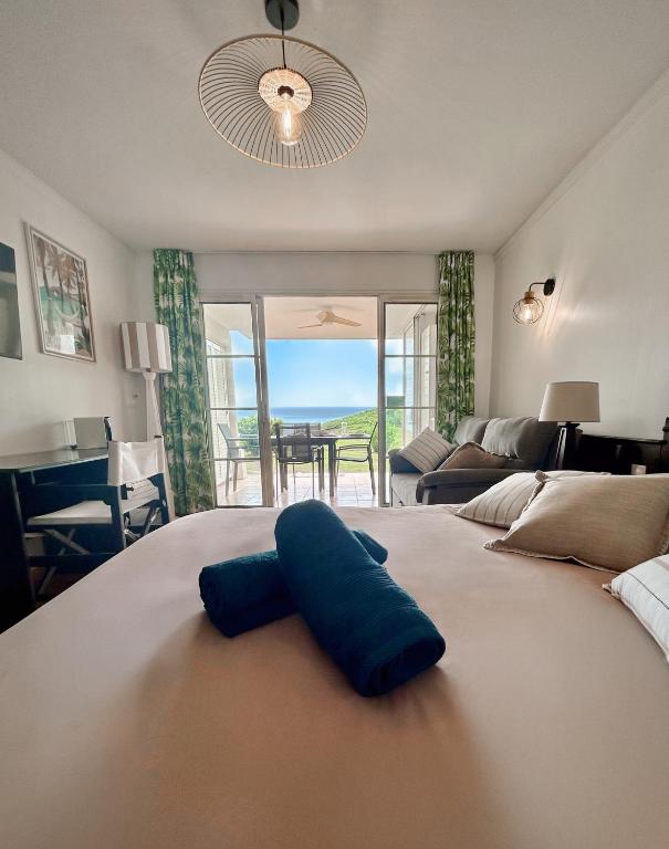 Paradis Bleu - Bord de mer, plage & piscine - Village Vacances, Sainte-Anne