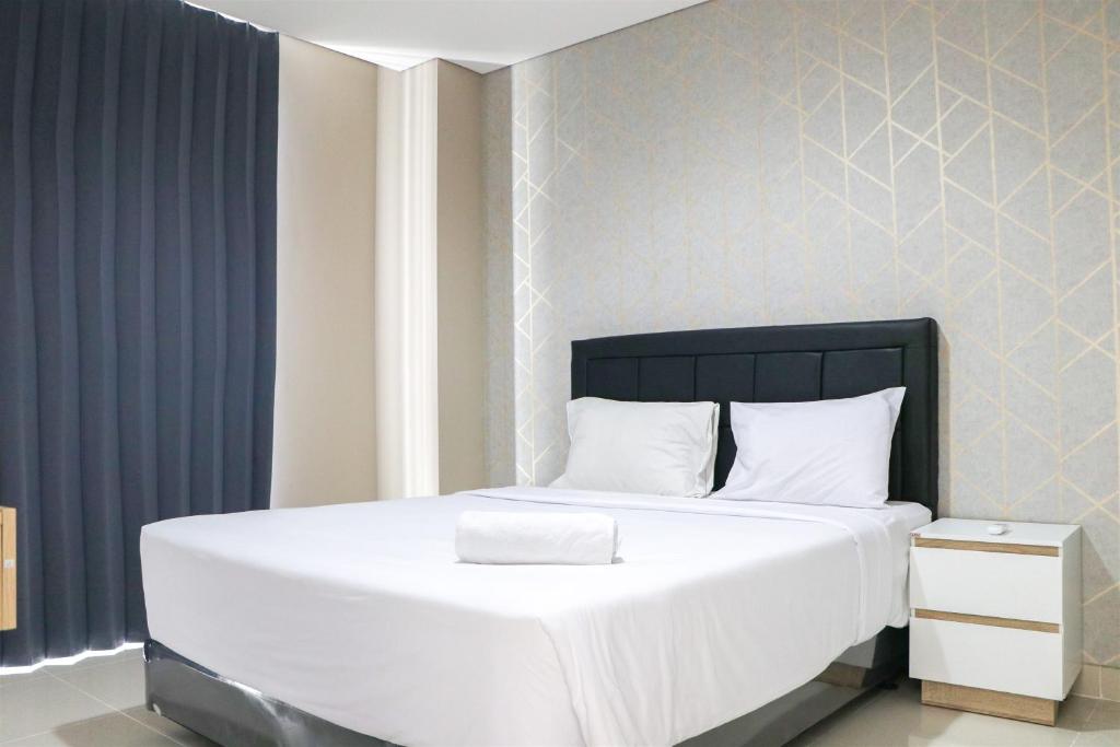 Modern and Compact Designed 1BR at Ciputra International Apartment By Travelio, Jakarta