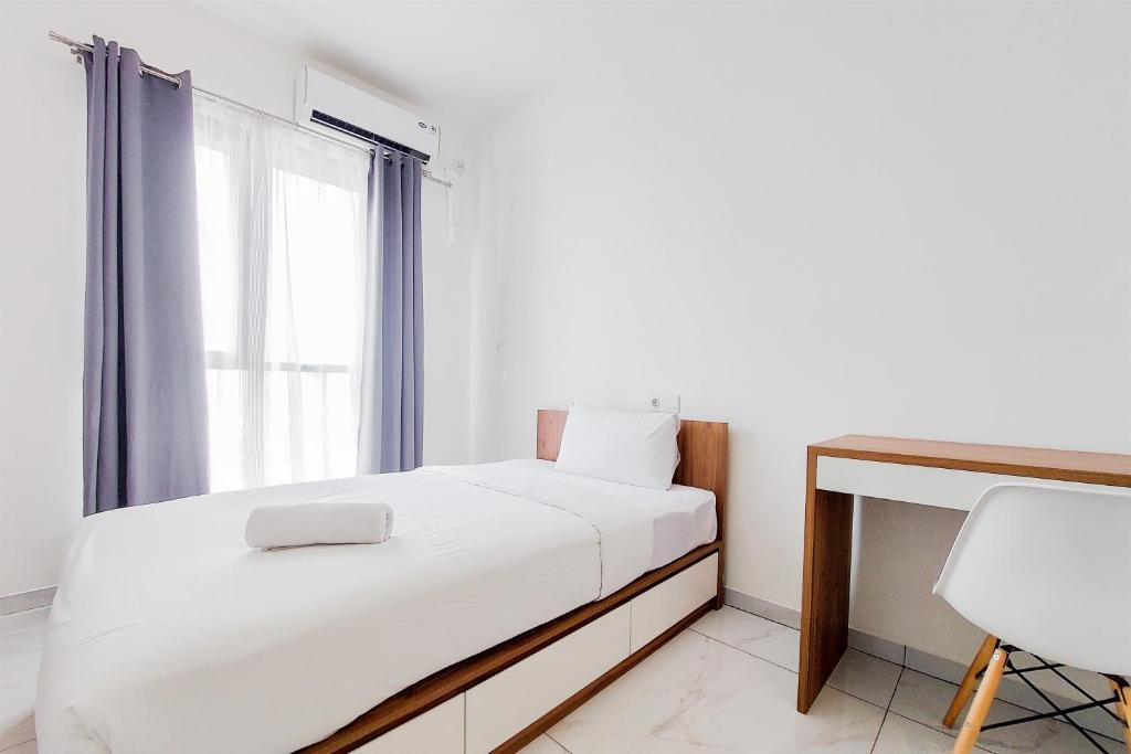 Warm Studio at 38th Floor Sky House Alam Sutera Apartment By Travelio, Tangerang