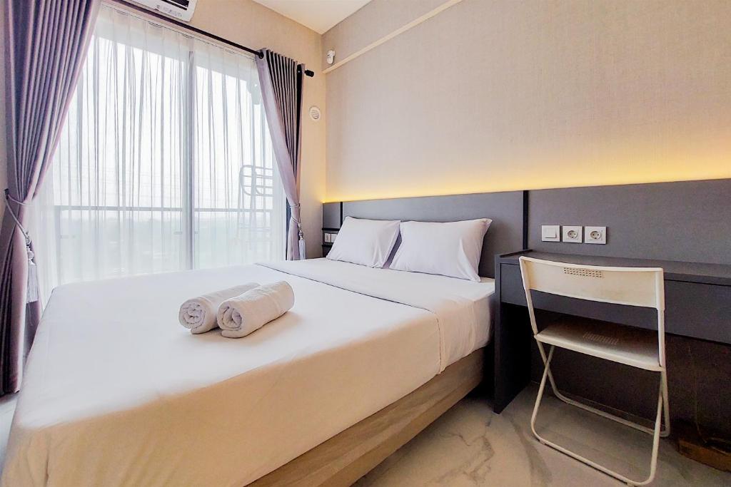 Gorgeous and Tidy Studio at Sky House BSD Apartment By Travelio, Tangerang