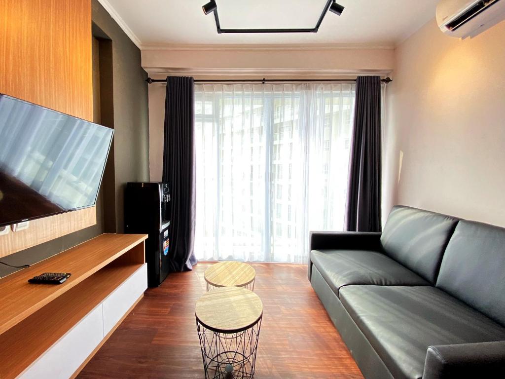 Nice 2BR at Gateway Pasteur Apartment By Travelio