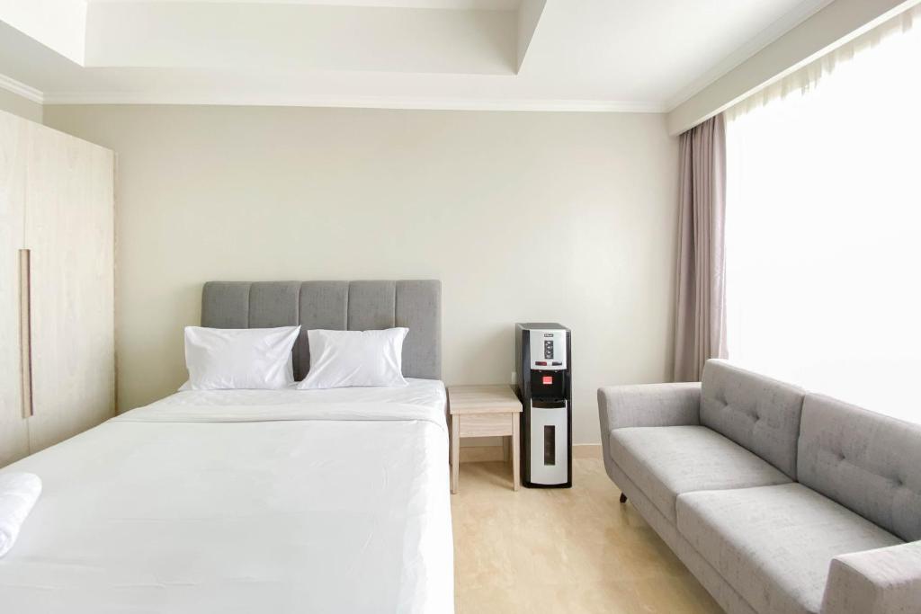 Nice and Elegant Designed Studio at Menteng Park Apartment By Travelio, Jakarta