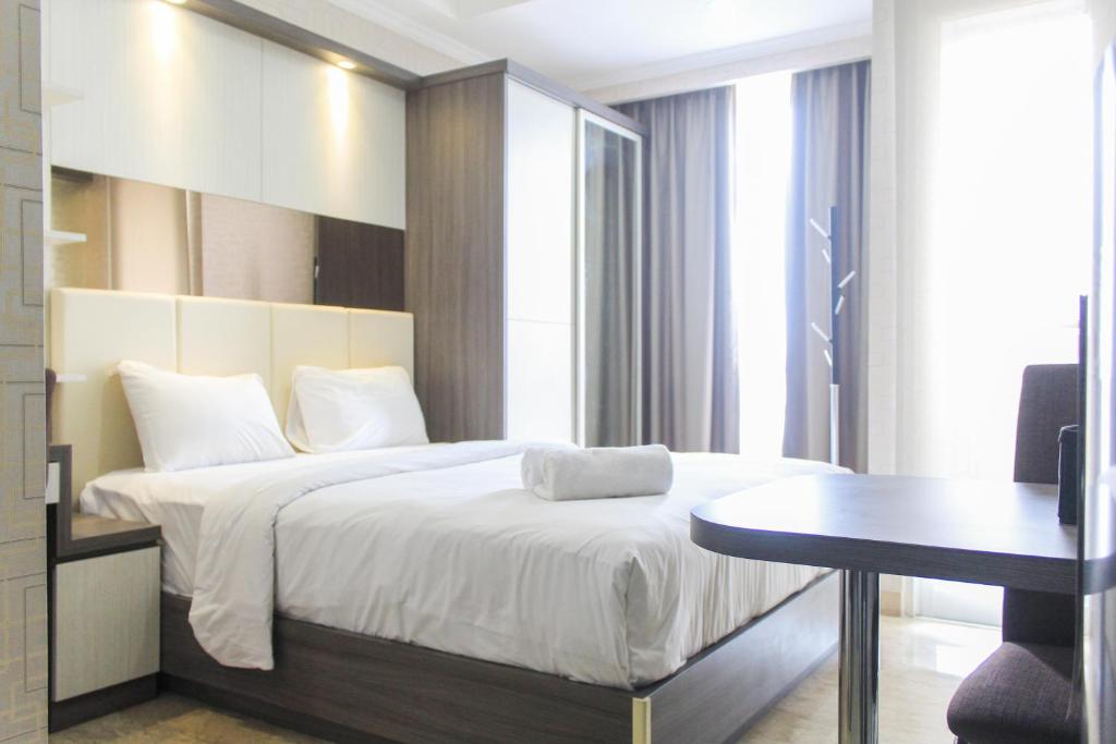 Nice and Fancy Studio Room at Menteng Park Apartment By Travelio, Jakarta