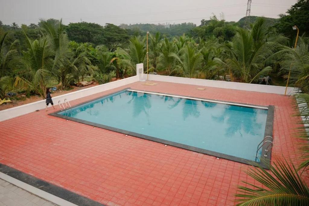 Swimming pool, Anuradha Home Stay in Mangalore