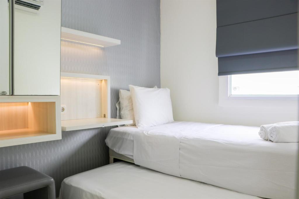 Simply 2BR Apartment at Parahyangan Residence By Travelio, Bandung