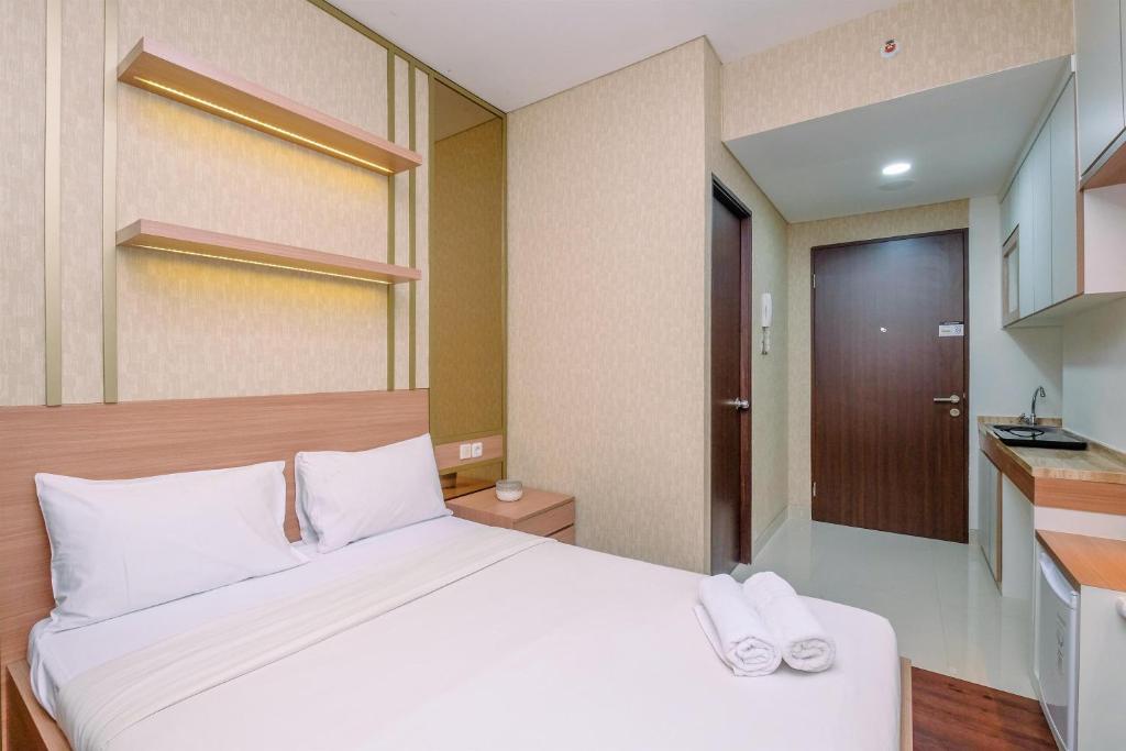 Cozy Studio at Transpark Cibubur Apartment By Travelio, Depok