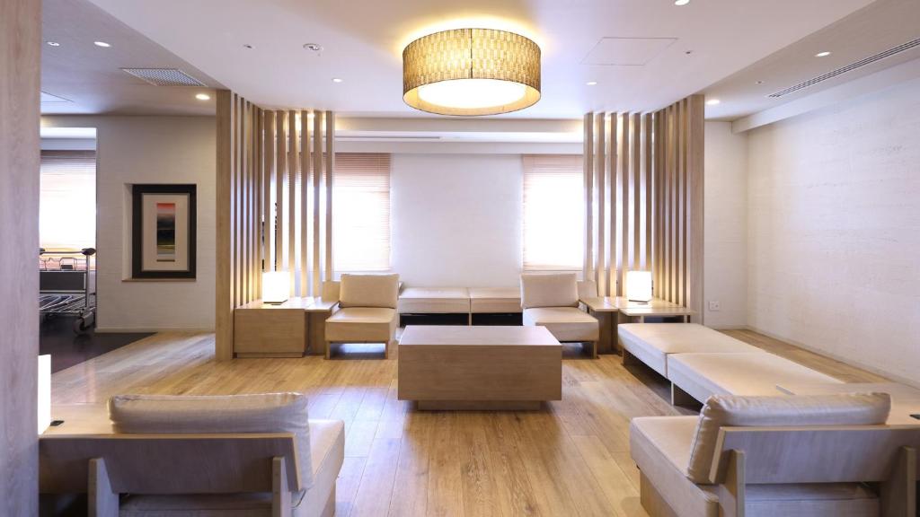 내추럴 핫 스프링 스파 도미 인 기후 에키마에 호텔 이미지 1