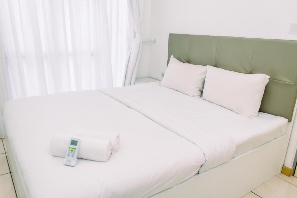 Warm and Minimalist 3BR Apartment at M-Town Residence By Travelio, Tangerang