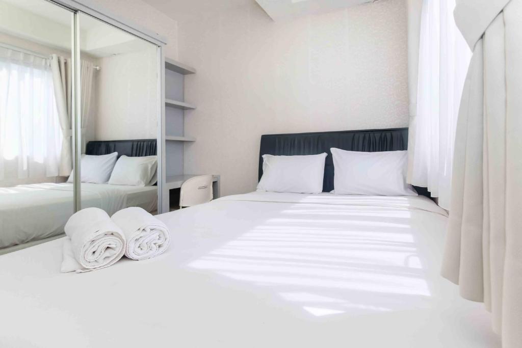 Comfort and Simple 2BR at Pakubuwono Terrace Apartment By Travelio, Jakarta