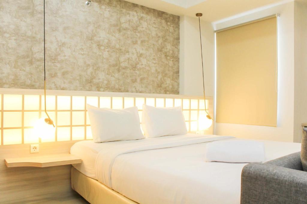 Modern and Spacious Studio Apartment at Mustika Golf Residence By Travelio, Cikarang
