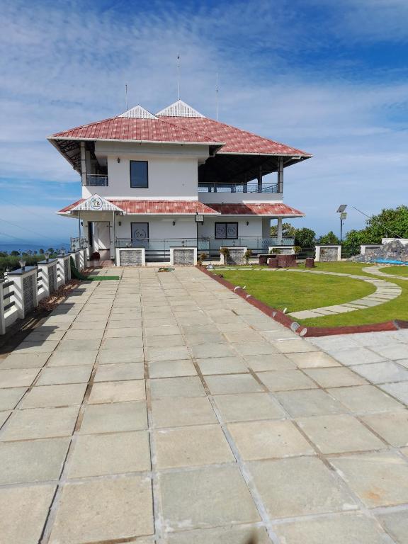 Plachoos Gardens - A luxury serviced villa in Kuttikkanam, Peermede, Pīrmed