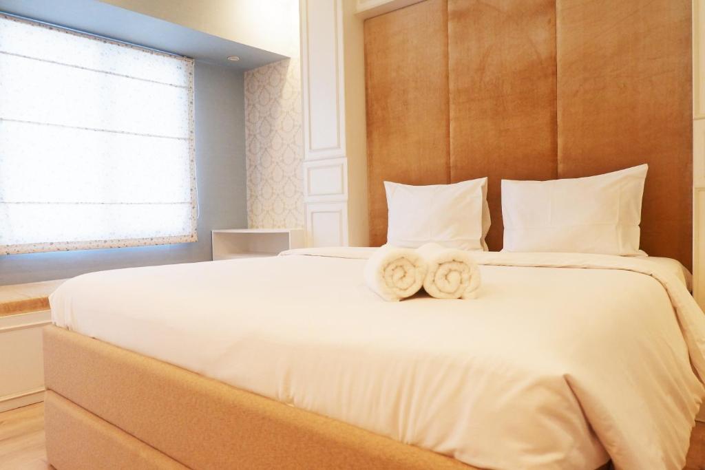 Modern Studio Apartment at Tanglin Tower Supermall Mansion By Travelio, Surabaja