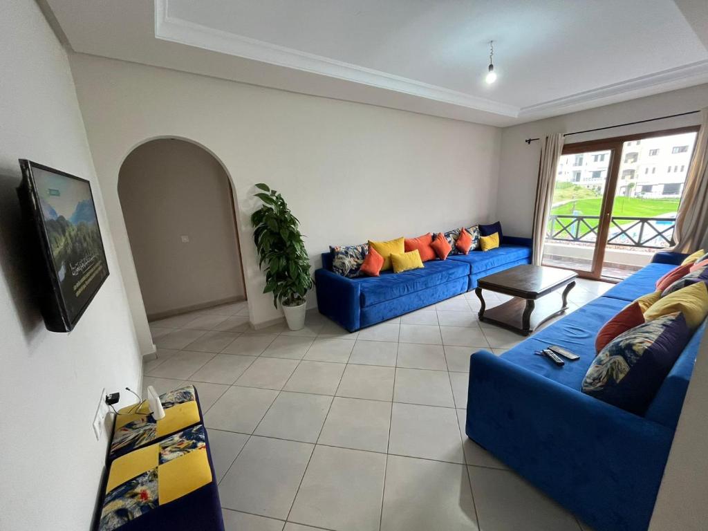 Shared lounge/TV area, Lilac's Garden vue piscine in Cabo Negro