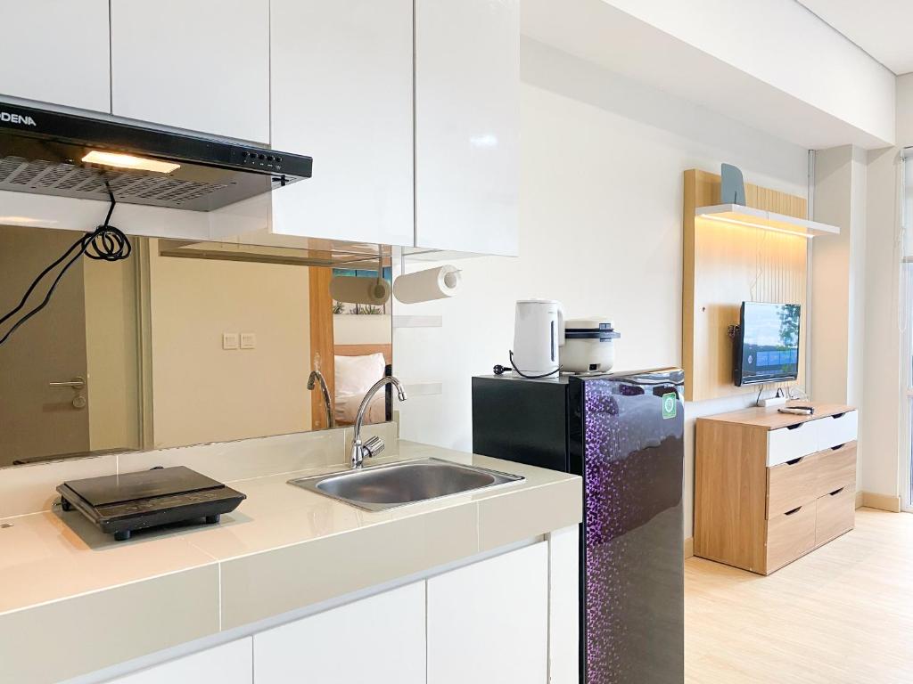 Relaxing Studio at Vasanta Innopark By Travelio キッチン