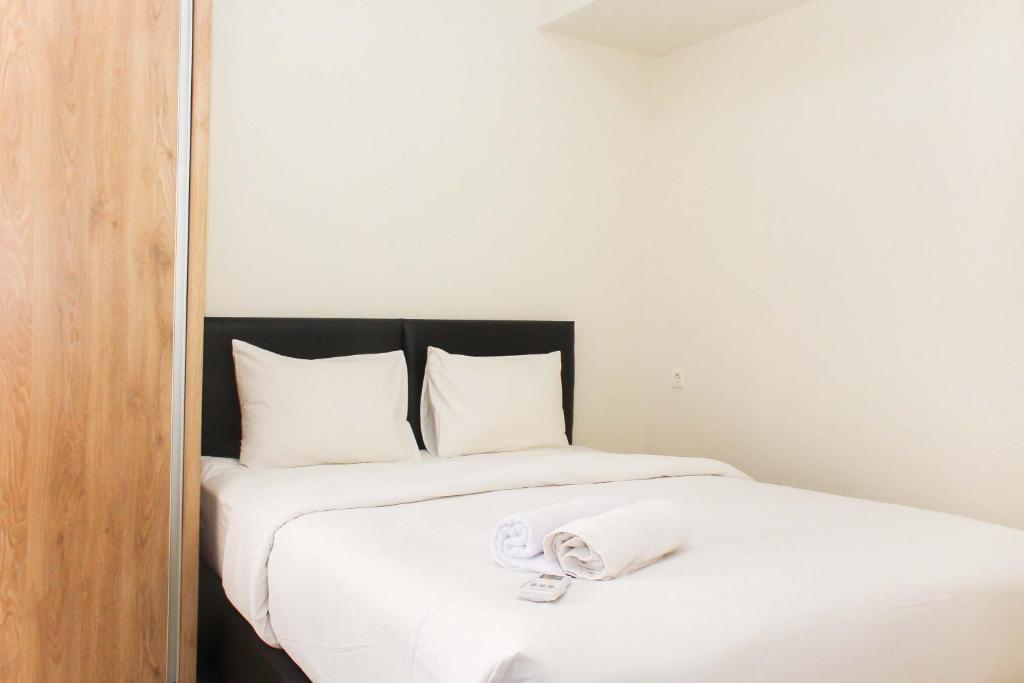 Comfortable 2BR Apartment at Mustika Golf Residence By Travelio, Cikarang