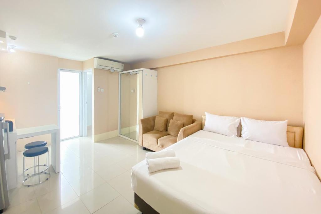 Cozy Studio at 30th Floor Bassura City Apartment By Travelio, Jakarta