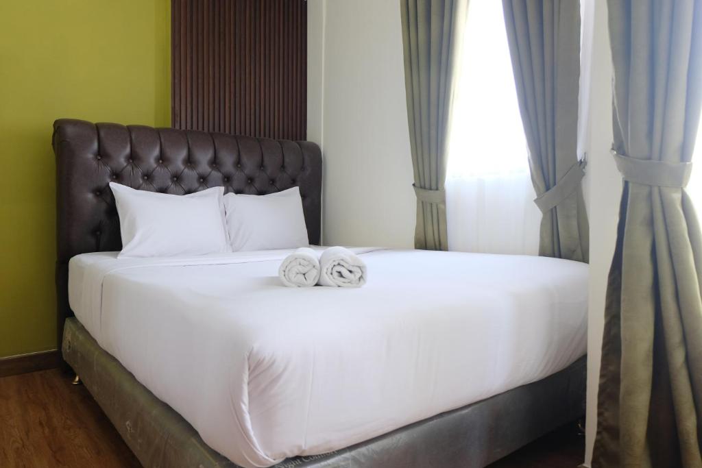 Spacious and Modern 3BR Apartment at Gateway Ahmad Yani Cicadas By Travelio, Bandung