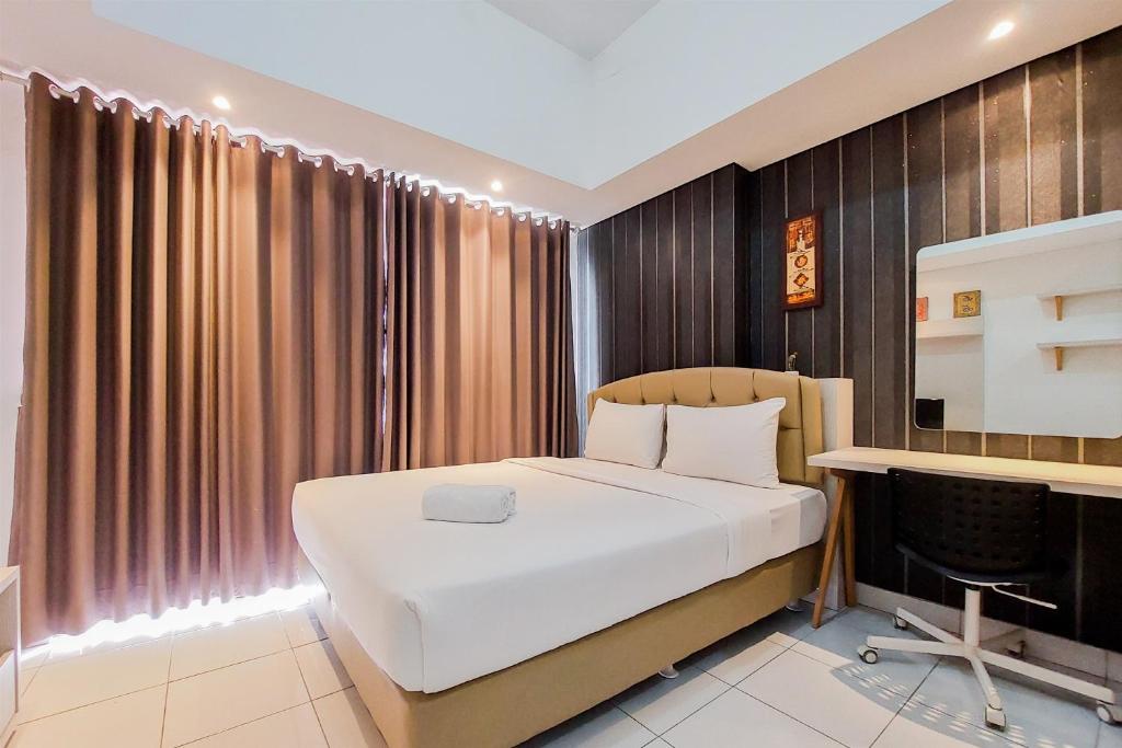 Tranquil and Homey Studio at Casa De Parco Apartment By Travelio, Tangerang