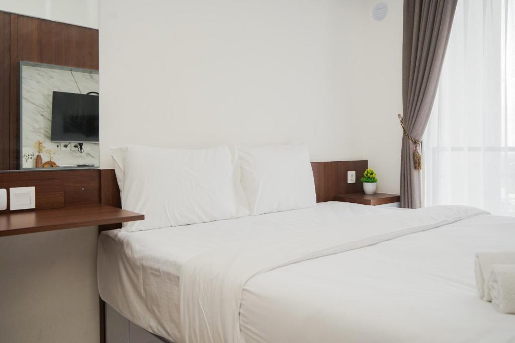 Spacious and Smart Studio Apartment at Sky House BSD By Travelio, Tangerang