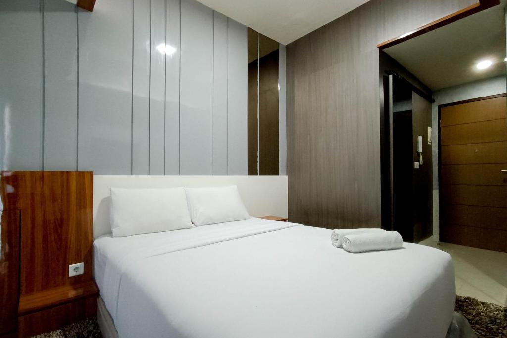 Relaxing Studio at Vida View Makassar Apartment By Travelio, Pampang