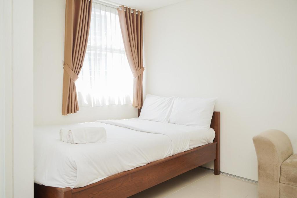Comfortable and Minimalist Studio at Tuscany Residences Apartment By Travelio, Tangerang