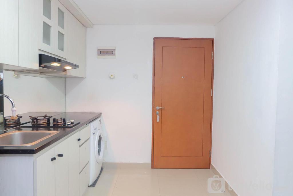 Elegant and High Floor 2BR Apartment at Royal Olive Residence By Travelio, Jakarta