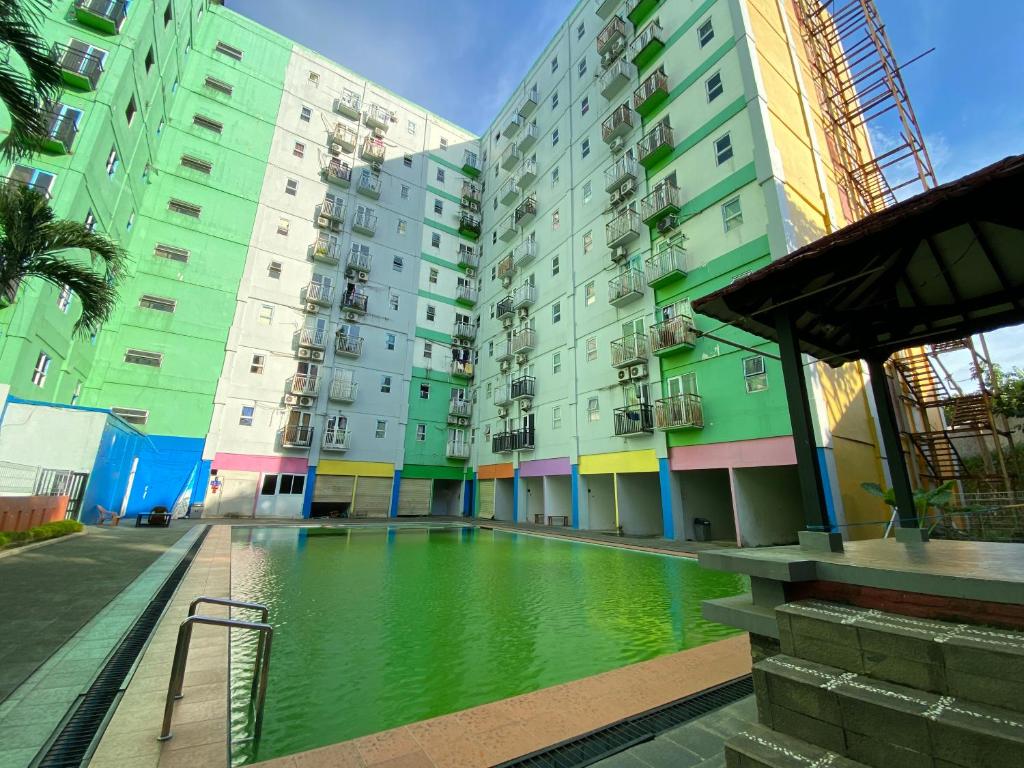 Comfort 2BR at Bogor Mansion Apartment By Travelio