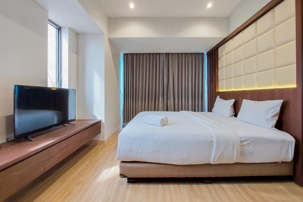 Nice and Spacious 2BR with Extra Room at Branz BSD City Apartment By Travelio, Tangerang