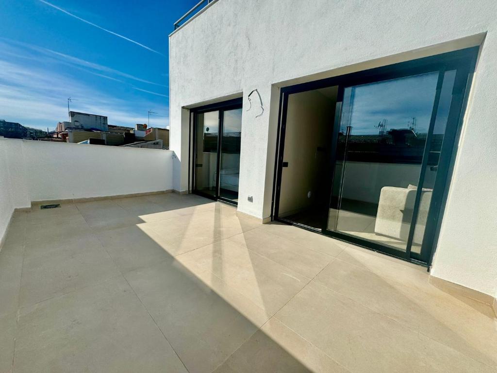 Sant Carles 52, Santa Coloma