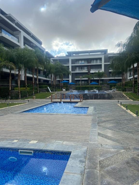 Peaceful Patio 2BR at AUC & Westin Hotel