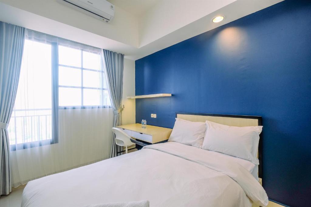 Elegant Studio at Evenciio Margonda Apartment By Travelio, Depok