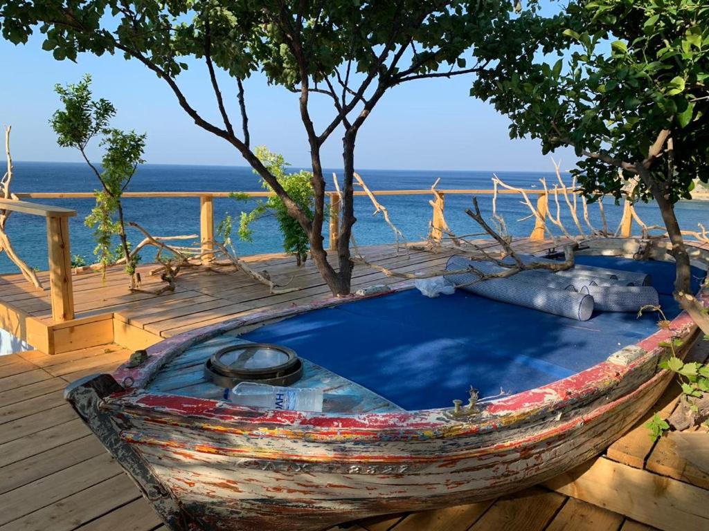 House with balcony on the sea, Plomarion