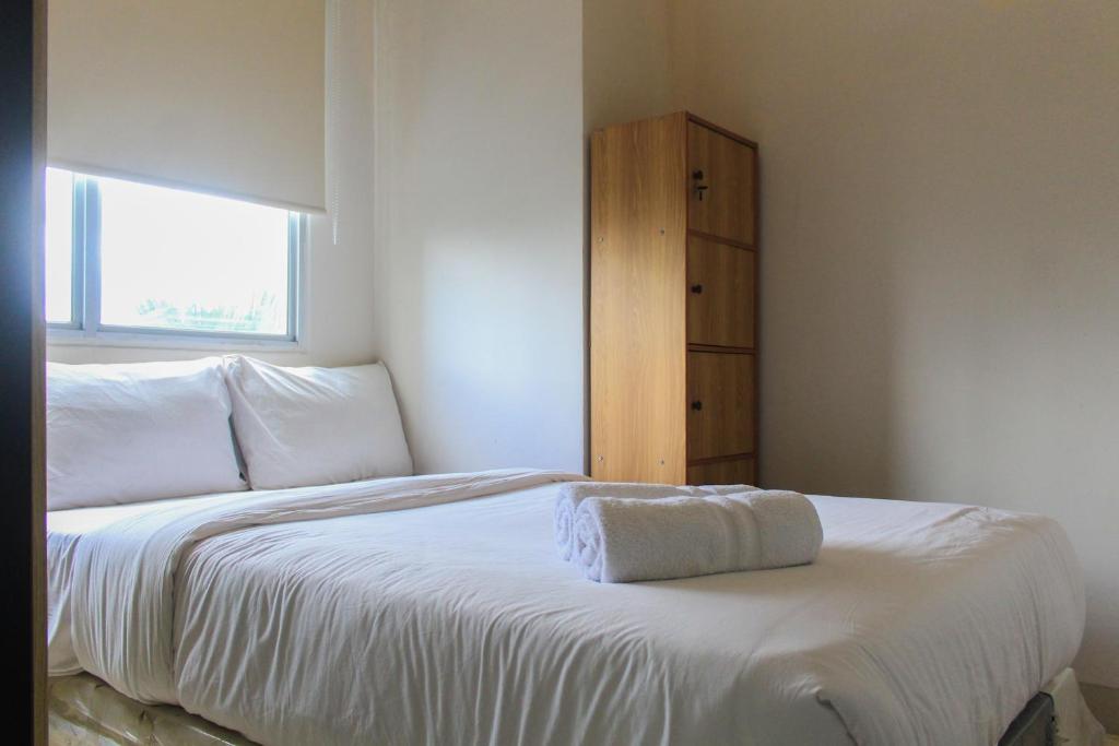 Comfy and Best View 2BR at Serpong Greenview Apartment By Travelio, Tangerang