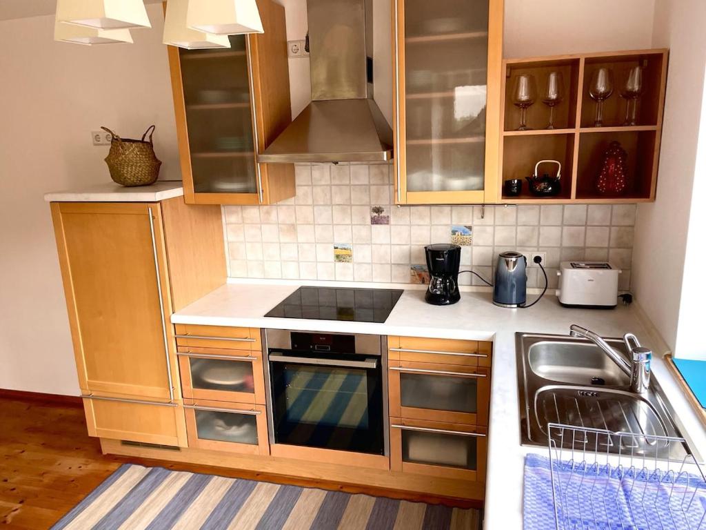 Ferienwohnung Kommod mit Garten und Bergblick - 5