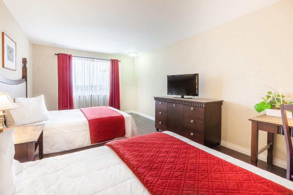 Ambassadeur Hotel Et Suites Photo 23