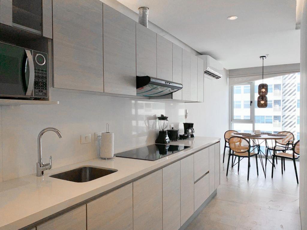 Suites cerca del aeropuerto - terminal terrestre y centros comerciales - 5