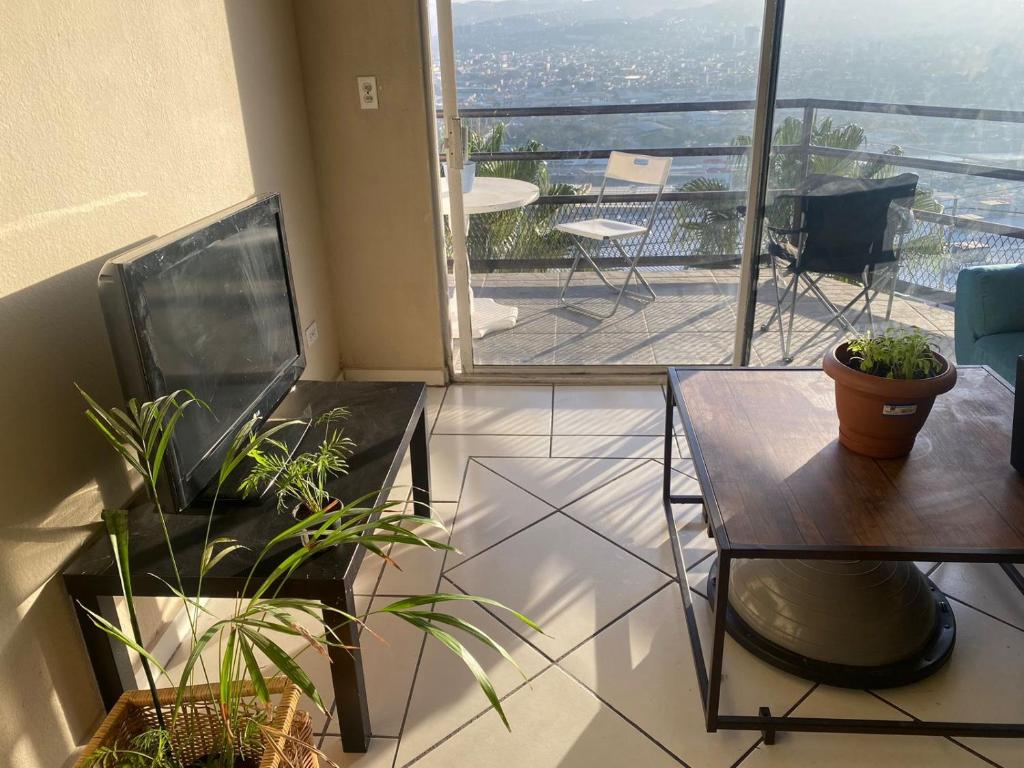 Habitación en departamento con vista a la ciudad - 3
