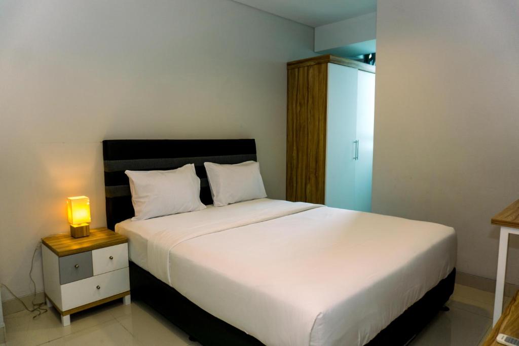 Nice and Elegant 2BR Apartment at Springhill Terrace Residence By Travelio, Jakarta