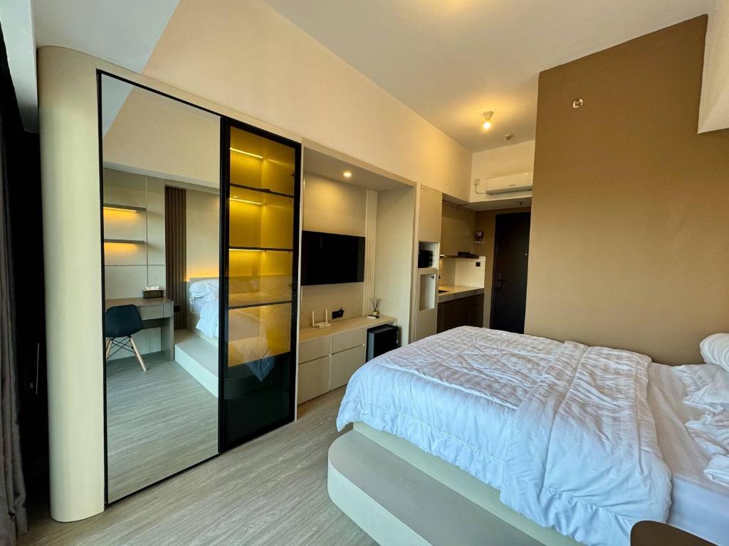 Serene Studio at Casa De Parco Apartment, Samporo