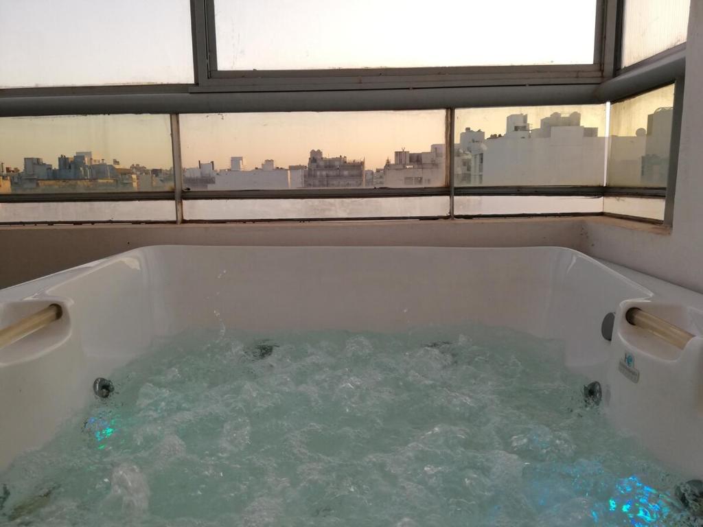 Semipiso de DOS HABITACIONES con terraza y jacuzzi - capacidad 4 personas - 3