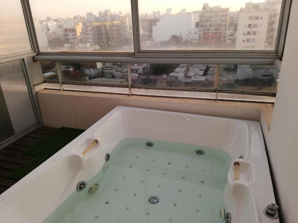 Semipiso de DOS HABITACIONES con terraza y jacuzzi - capacidad 4 personas - 4