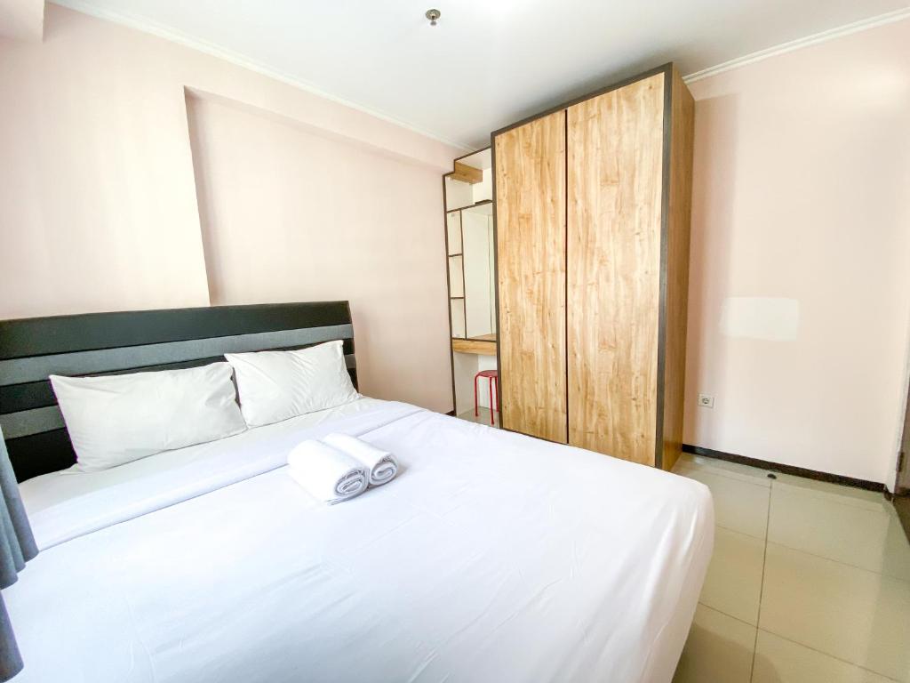 Minimalist 2BR with Pool View at Gateway Pasteur Apartment By Travelio, Bandung