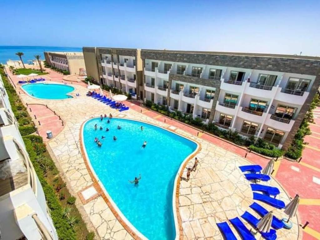 Furnished & kitchen Seaview chalet Beachfront Near Airport, Hurghada