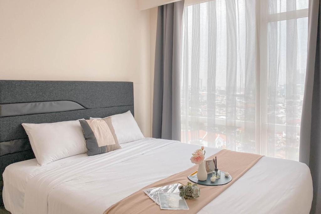 Elegant and Nice 2BR at Menteng Park Apartment By Travelio, Jakarta