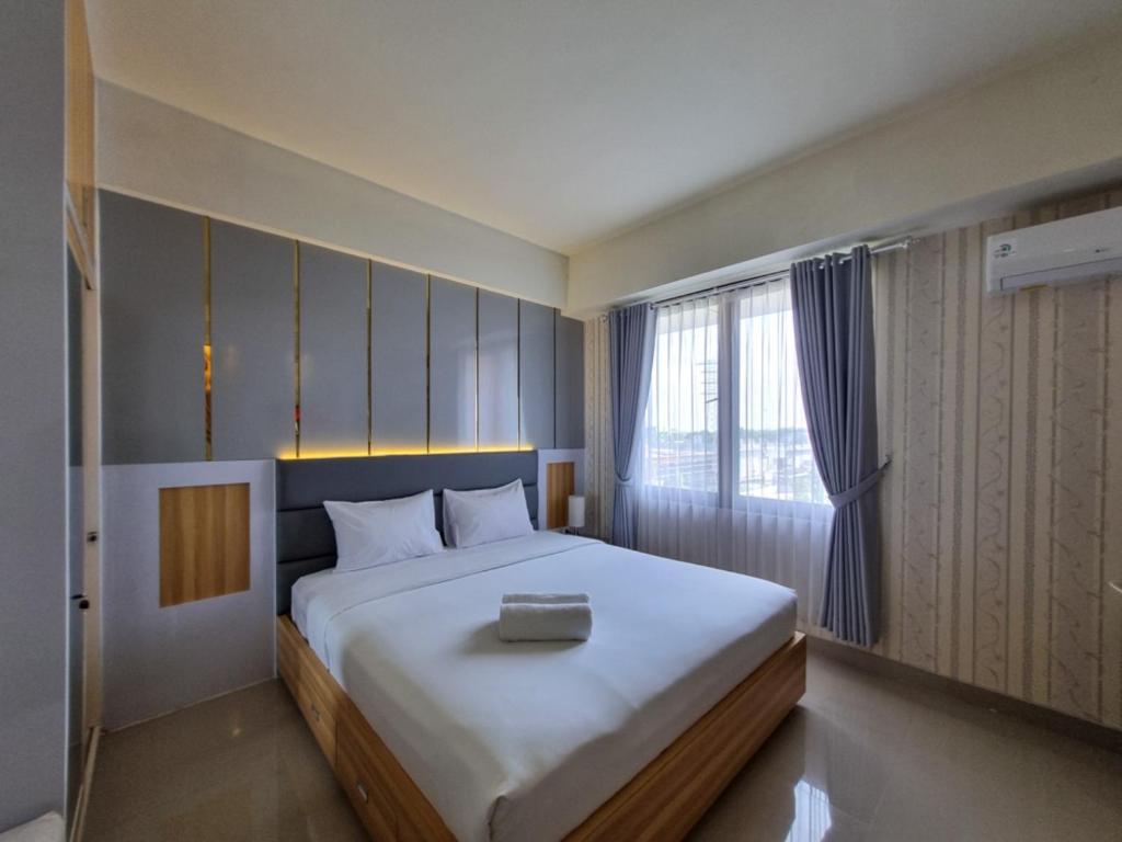 Best Place and Cozy Studio at Altuz Seturan Yogyakarta Apartment By Travelio, Seturan