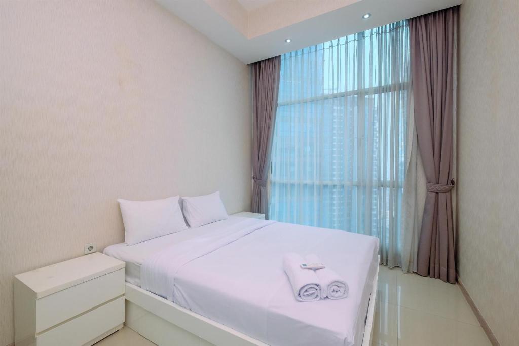 Elegant and Comfy 2BR Apartment at Casa Grande Residence By Travelio, Jakarta