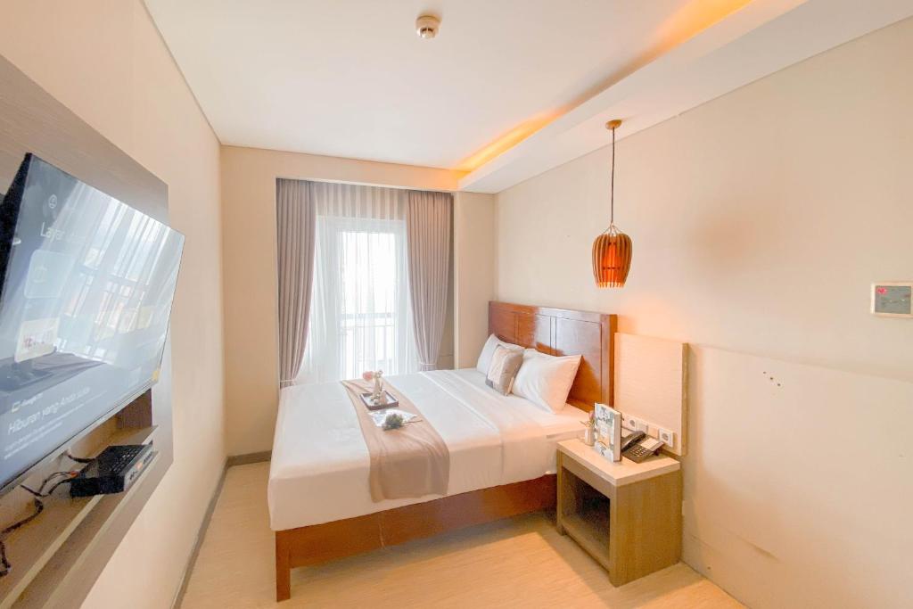 Good Place Studio at Grand Palace Kemayoran Apartment By Travelio, Jakarta