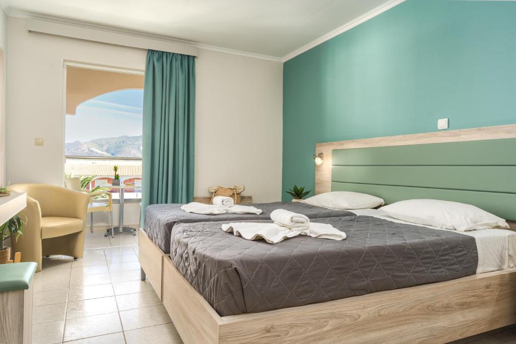 Poseidon Beach Hotel — Hotel rooms in Laganas, Ionian Islands