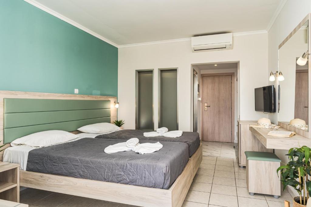 Poseidon Beach Hotel — Hotel rooms in Laganas, Ionian Islands